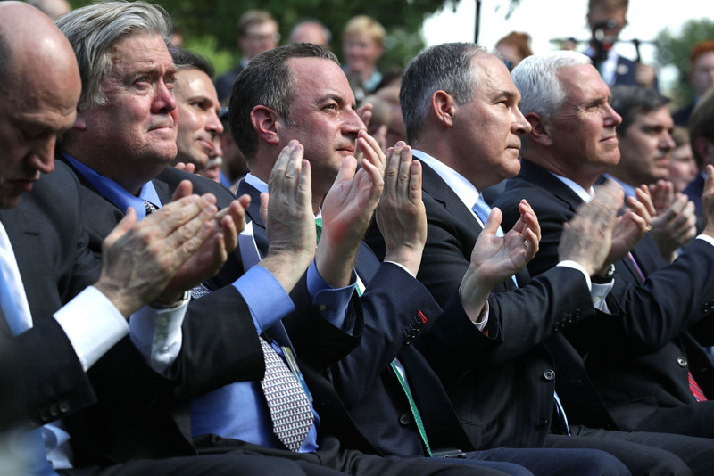 Members of the Trump regime clap along like subservient children as President Donald Trump announces America’s withdrawal from the Paris Accord (Photo by Chip Somodevilla/Getty Images)